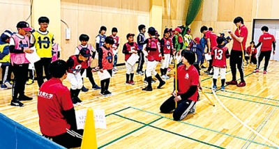 写真：北翔大生が協力して行われた小中学生の体力測定会（提供写真）