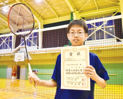 写真:「全国ベスト8」を目標に練習に打ち込む山田さん