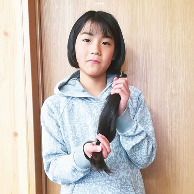 写真:ヘアドネーションに協力した中田さん